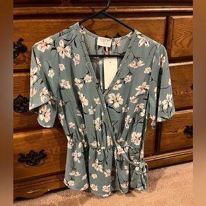 Blue flower blouse. Never worn. Still has tags
